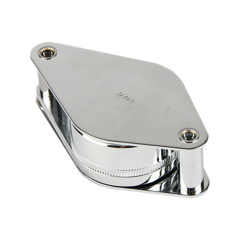 The compact Alfa Mirage Ruper jewelry pocket loupe fully closed inside its protective chrome metal housing. The compact Alfa Mirage Ruper jewelry pocket loupe fully closed inside its protective chrome metal housing.