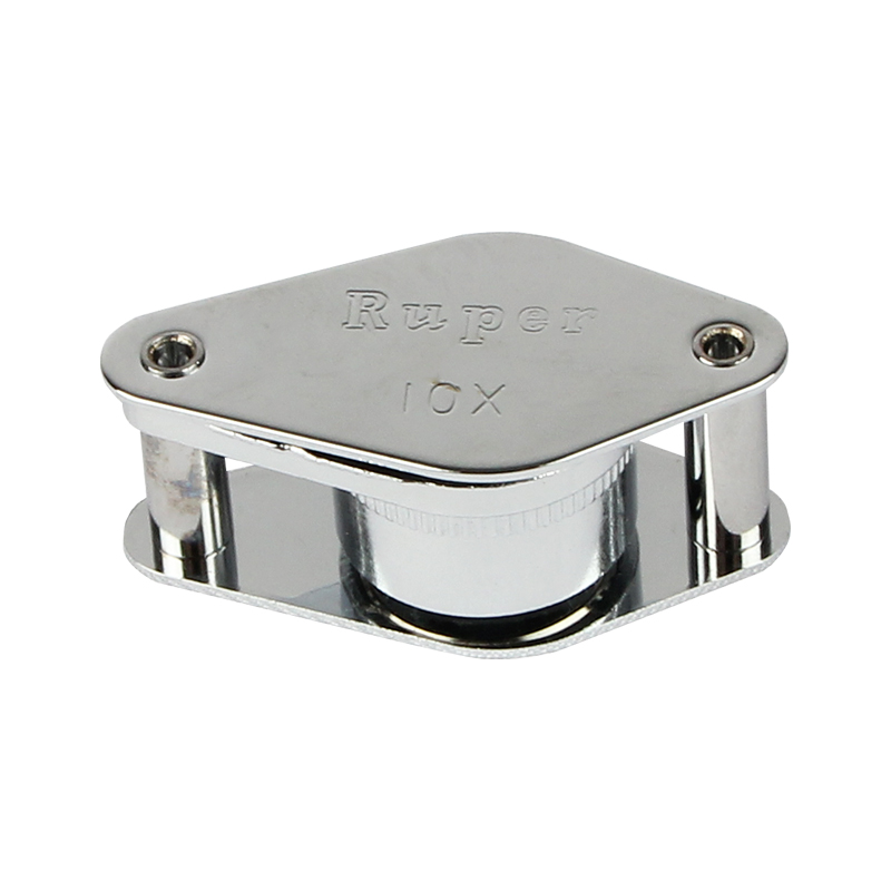 Side profile view of the Alfa Mirage Ruper professional gemstone folding magnifier in a semi-open inspection state. Side profile view of the Alfa Mirage Ruper professional gemstone folding magnifier in a semi-open inspection state.