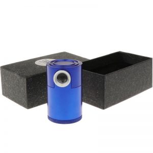The blue aluminum JYBS diamond inscription loupe standing upright next to its black custom-fitted storage packaging box.