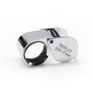 The JYBS professional diamond triplet loupe featuring twenty times magnification and a twenty-one millimeter lens diameter.
