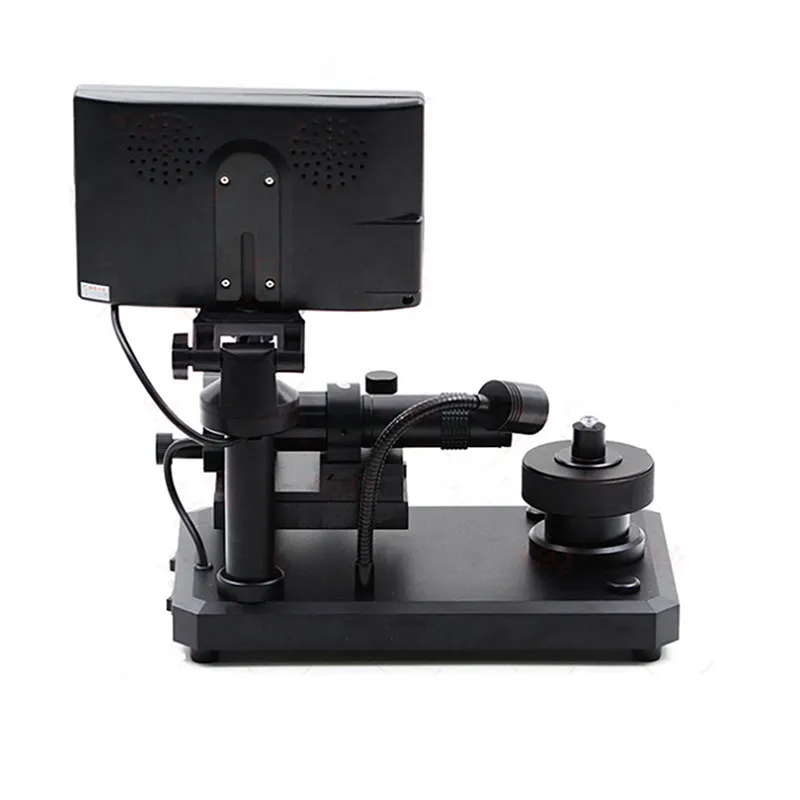 Rear-facing view of the JYBS digital diamond inscription loupe illustrating the fiber optic cable routing and screen mount. Rear-facing view of the JYBS digital diamond inscription loupe illustrating the fiber optic cable routing and screen mount.