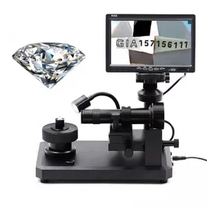 The JYBS digital diamond inscription loupe displaying a sharp GIA tracking number across its 7-inch display.
