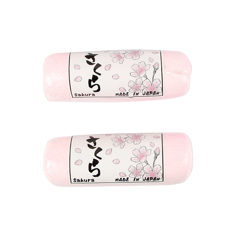 One unwrapped pink SAKURA Polishing Compound above a wrapped one with a "Sakura MADE IN JAPAN" label. One unwrapped pink SAKURA Polishing Compound above a wrapped one with a "Sakura MADE IN JAPAN" label.