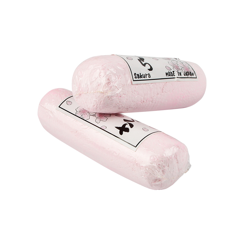 Two wrapped pink SAKURA Polishing Compounds side-by-side, showing "Sakura MADE IN JAPAN" labels. Two wrapped pink SAKURA Polishing Compounds side-by-side, showing "Sakura MADE IN JAPAN" labels.