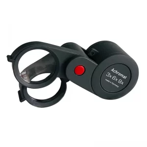 The Eschenbach 1186-9 achromatic folding loupe showing both its 3X and 6X glass lenses extended in a stacked position.
