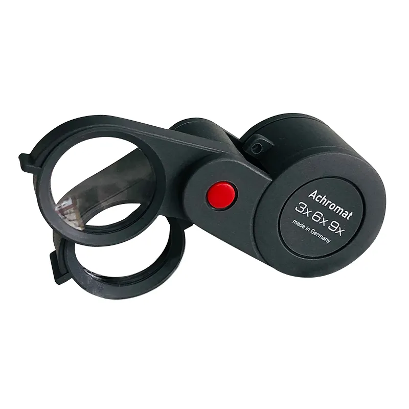 The Eschenbach 1186-9 achromatic folding loupe showing both its 3X and 6X glass lenses extended in a stacked position. The Eschenbach 1186-9 achromatic folding loupe showing both its 3X and 6X glass lenses extended in a stacked position.