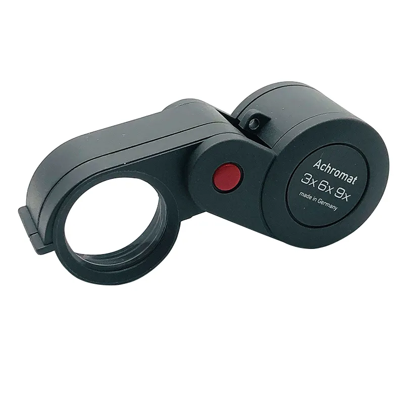 Side angle view of the Eschenbach 3X, 6X, and 9X power pocket loupe with a single lens element deployed. Side angle view of the Eschenbach 3X, 6X, and 9X power pocket loupe with a single lens element deployed.