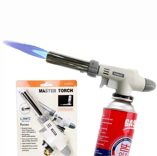 WS-516C Master Torch on red butane canister, long metal nozzle, blue flame, next to packaging.