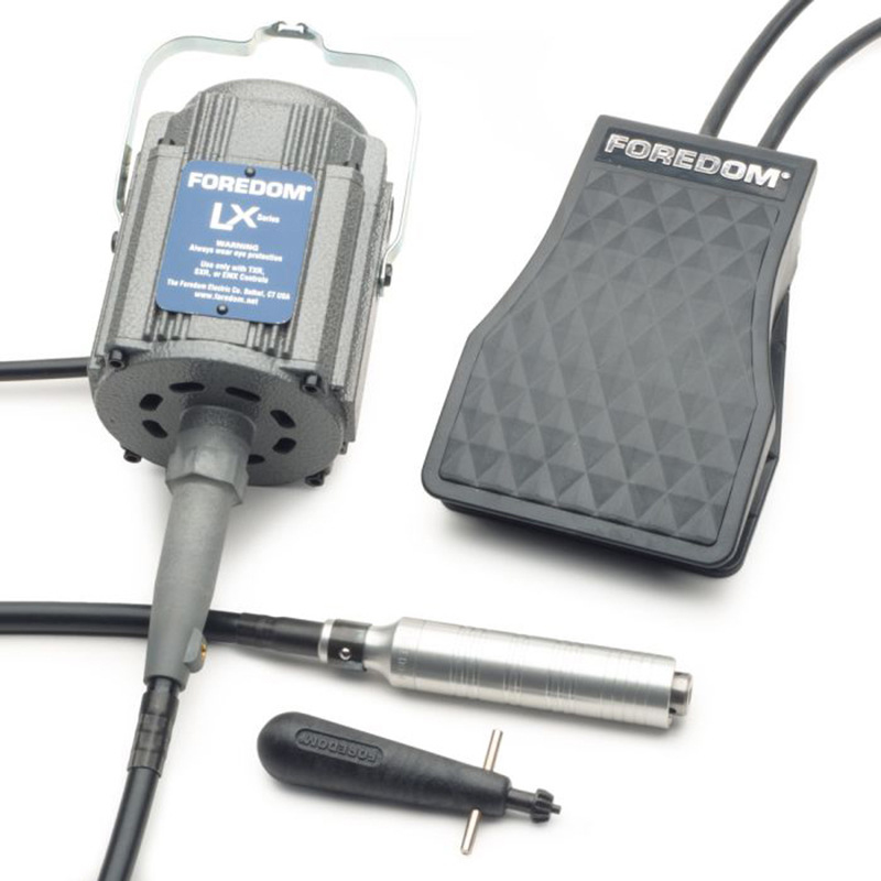 Close-up view of the Foredom LX Motor, C.FCH-2 Foot Control, and H.30 handpiece with chuck key. Close-up view of the Foredom LX Motor, C.FCH-2 Foot Control, and H.30 handpiece with chuck key.