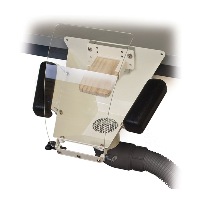 Foredom Fishmouth Dust Collector mounted under a bench with clear shield, bench pin, armrests, and vacuum hose attached. Foredom Fishmouth Dust Collector mounted under a bench with clear shield, bench pin, armrests, and vacuum hose attached.