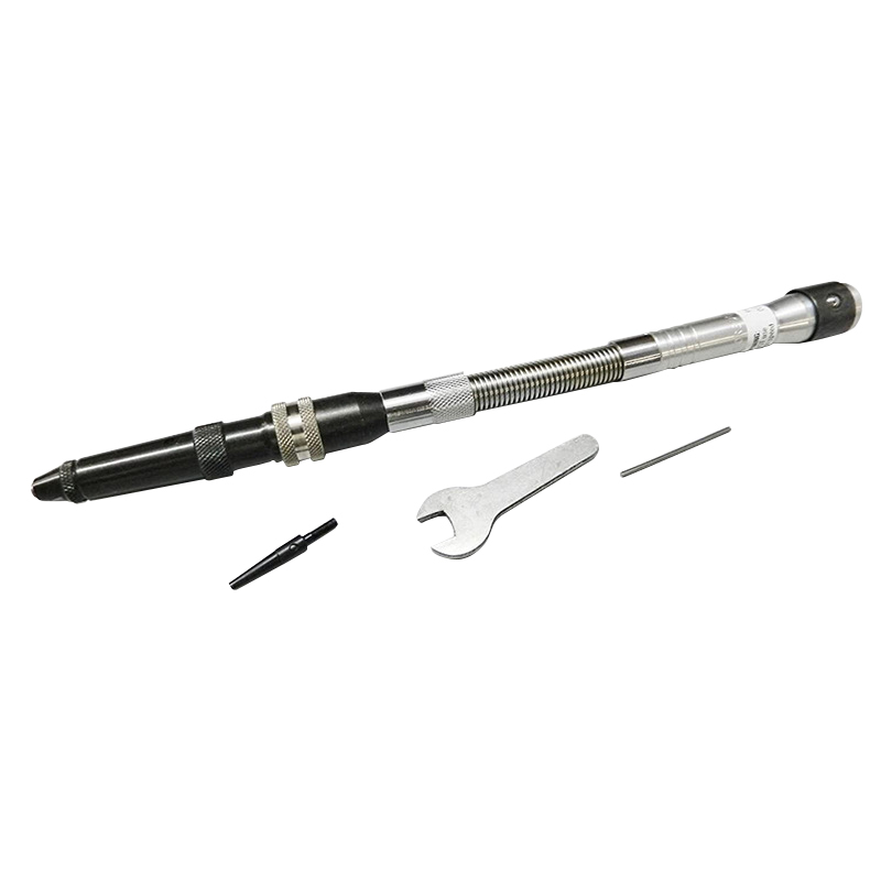 Foredom H.15D handpiece with wrench, anvil point, and pin laid out next to it. Foredom H.15D handpiece with wrench, anvil point, and pin laid out next to it.