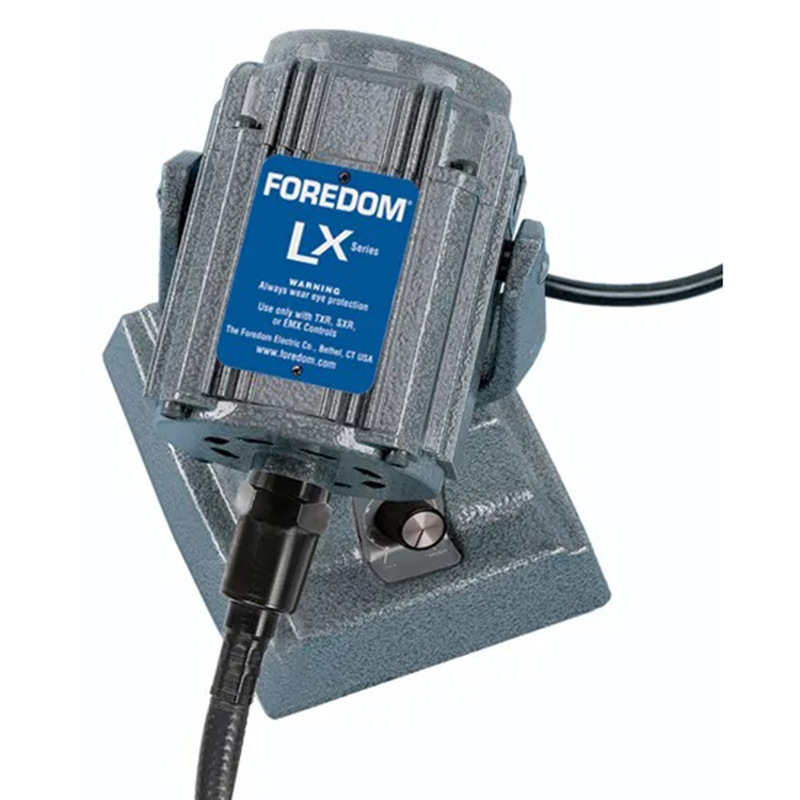 Foredom LX Motor on a motor base stand. Close-up view of the motor housing. Foredom LX Motor on a motor base stand. Close-up view of the motor housing.