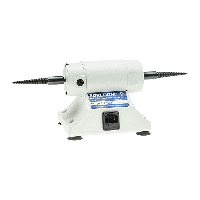 Foredom M BL 22 Precision Mini Bench Lathe rear view showing power input specifications and spindles. Foredom M BL 22 Precision Mini Bench Lathe rear view showing power input specifications and spindles.