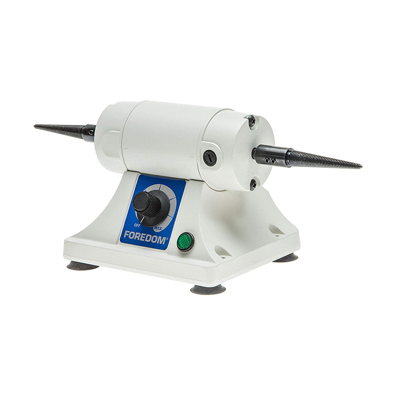 Foredom M BL 22 Precision Mini Bench Lathe side view with non skid feet tapered spindles and control knob. Foredom M BL 22 Precision Mini Bench Lathe side view with non skid feet tapered spindles and control knob.