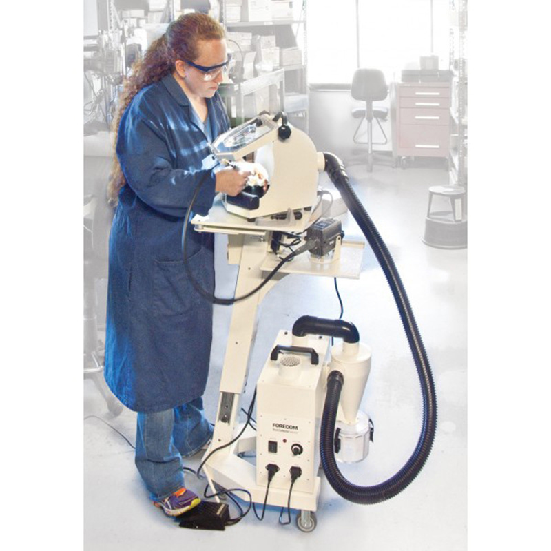 Foredom MADC20 Dust Collector in use by technician on a mobile stand connected to a polishing hood Foredom MADC20 Dust Collector in use by technician on a mobile stand connected to a polishing hood