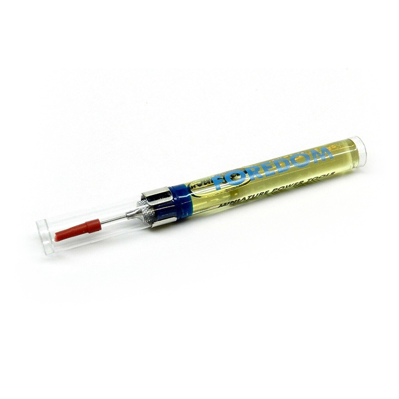 Foredom Precision Oiler containing yellow oil with Foredom branding visible on the side. Foredom Precision Oiler containing yellow oil with Foredom branding visible on the side.