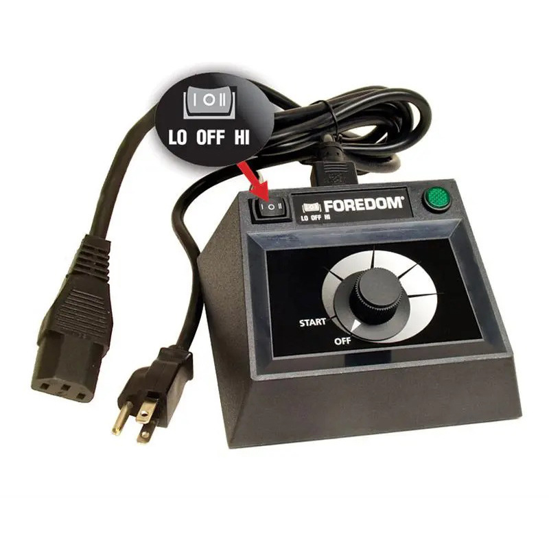 foredom c.emhf 2 230v dual speed table control Angled view of Foredom C.EMHF-2 230V Dual Speed Table Control, with cables and focus on the speed range switch.