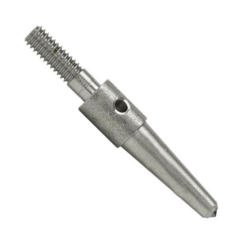 Close-up of a Foredom Pave or Carbide Stylus Tip, a metal cone with a threaded end and a small hole. Close-up of a Foredom Pave or Carbide Stylus Tip, a metal cone with a threaded end and a small hole.