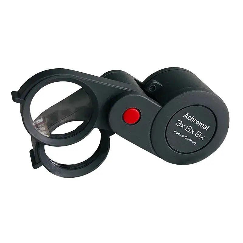 Eschenbach dual-lens folding magnifier with 3X, 6X, and 9X achromatic lenses for luxury item intake.