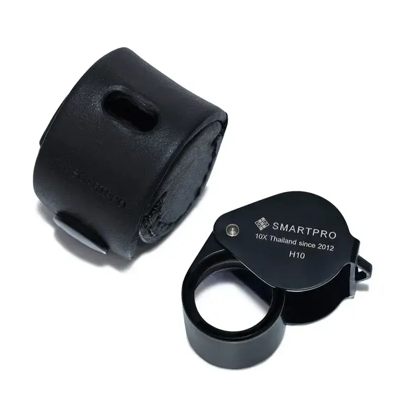 SmartPro H10 10X triplet loupe with a black finish and its protective leather carrying case for professional QC.