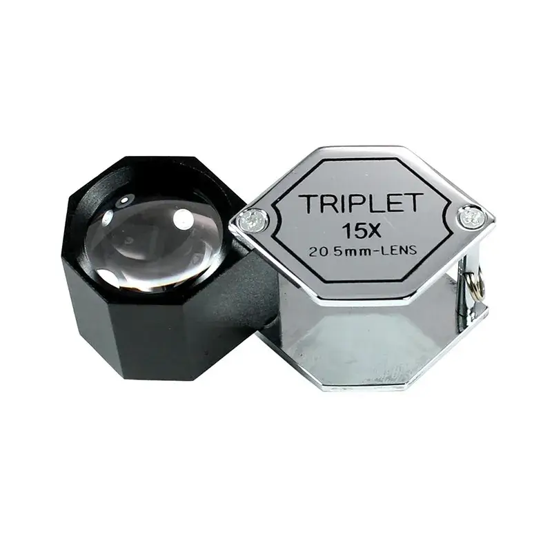 A 15x magnification hexagon-shaped triplet loupe with a 20.5mm lens and a polished silver folding cover.