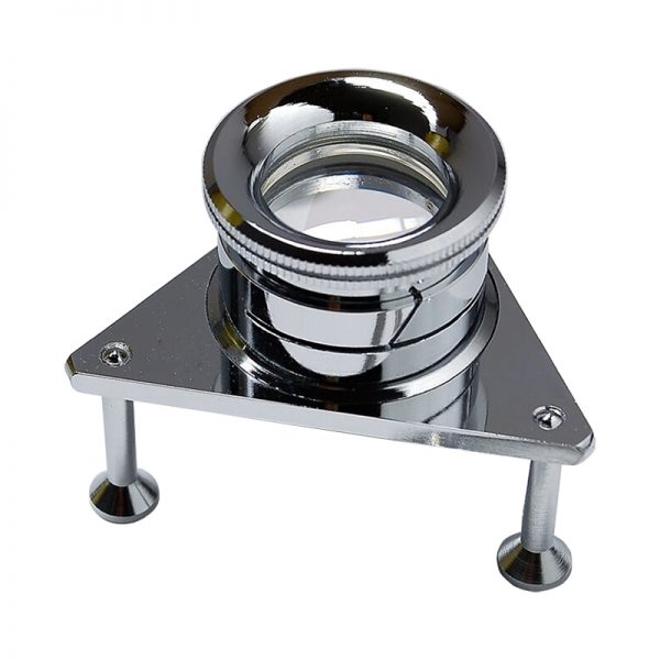 A classic chrome-plated tripod loupe with a fixed-focus magnifying lens on a three-legged metal stand.