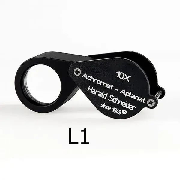 Harald Schneider L1 10x achromat aplanat professional diamond loupe magnifier on a white background.