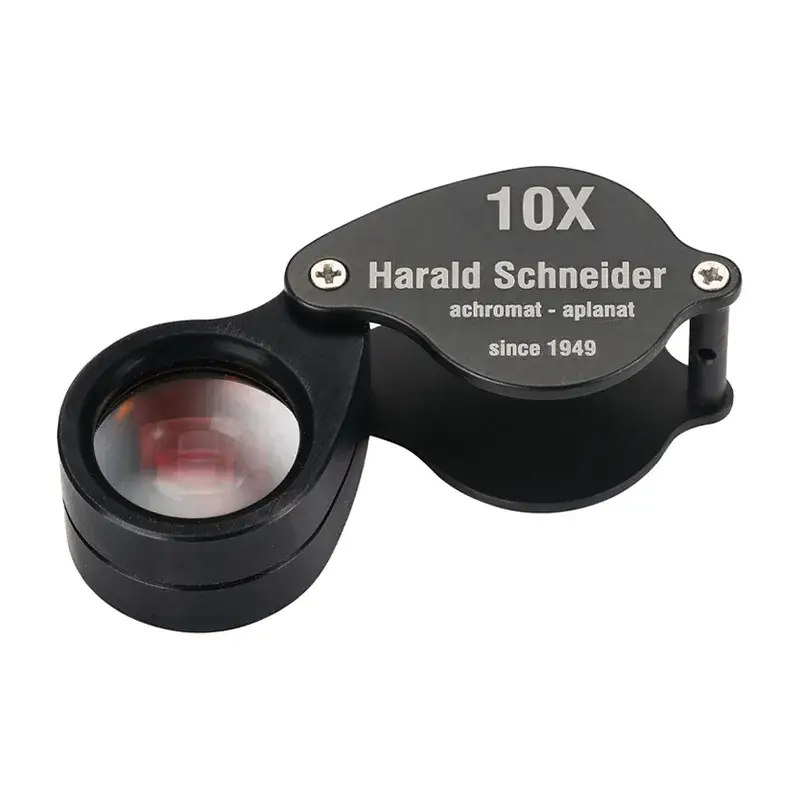 Harald Schneider 10X triplet loupe featuring achromat-aplanat optics for distortion-free gemstone color grading.
