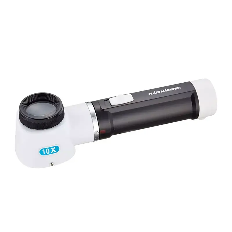 A handheld flash magnifier with a black and white body, 10x magnification lens, and a built-in LED light switch.