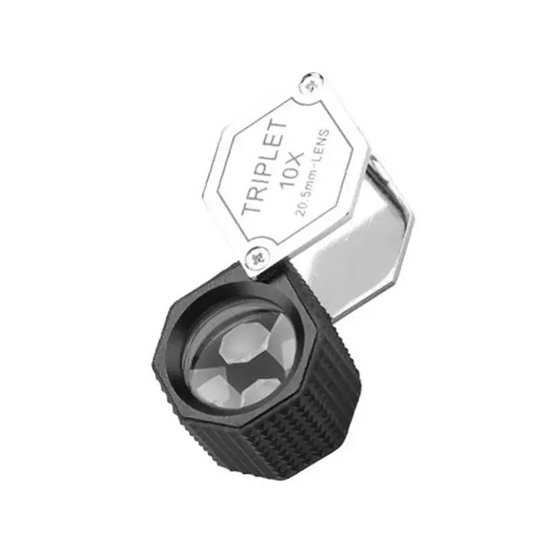 Professional folding triplet 10x hexagon loupe with a textured black non-slip rubber grip.