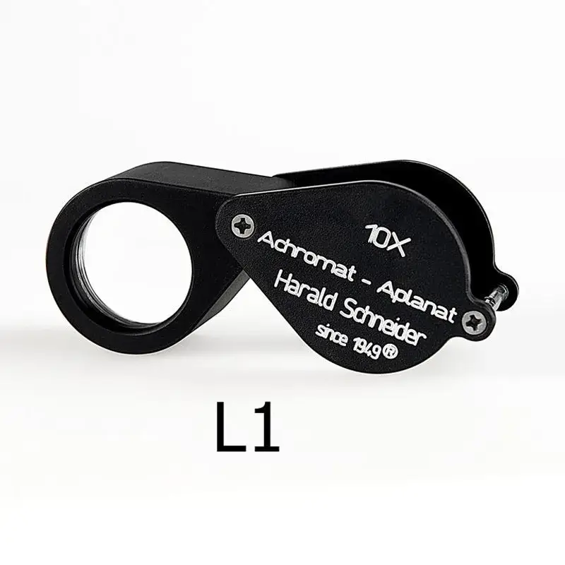 Harald Schneider L1 professional 10x achromatic aplanat diamond loupe magnifier on a white background.