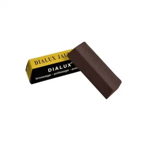 Dialux Jaune brown jewelry polishing compound bar alongside original yellow black packaging box, white background studio product photography