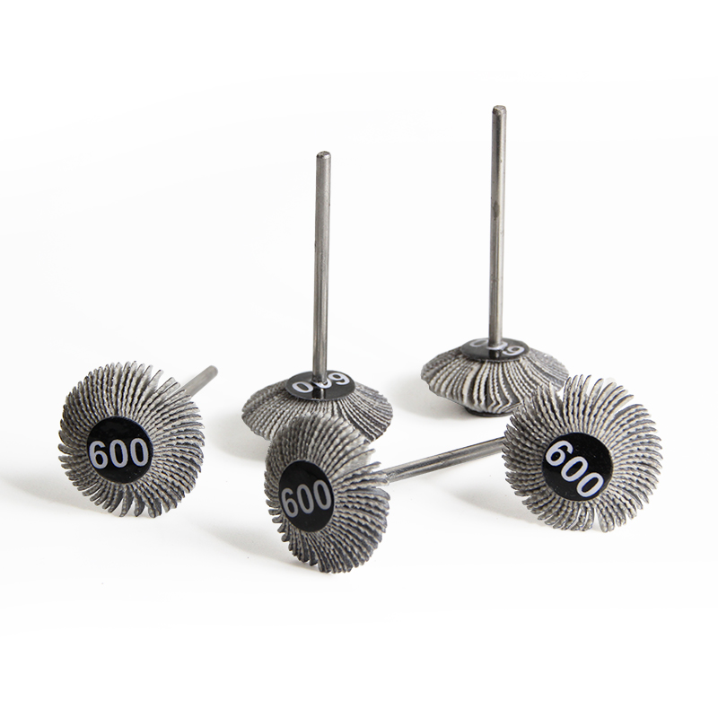 adn® mini mounted emery wheels diamond shape Group view of ADN 25x10mm mounted diamond flap wheels in 600# pre-polishing fine grit designed for tight crevice finishing.