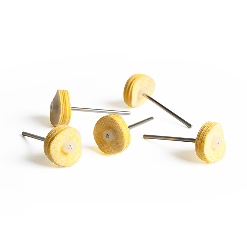 adn® mounted 3m chamois polishing wheels Five-piece arrangement of ADN 23mm multi-layer 3M artificial chamois flat disc wheels (SKU: BFFC1070) showing the layered edge profile and steel mandrels.