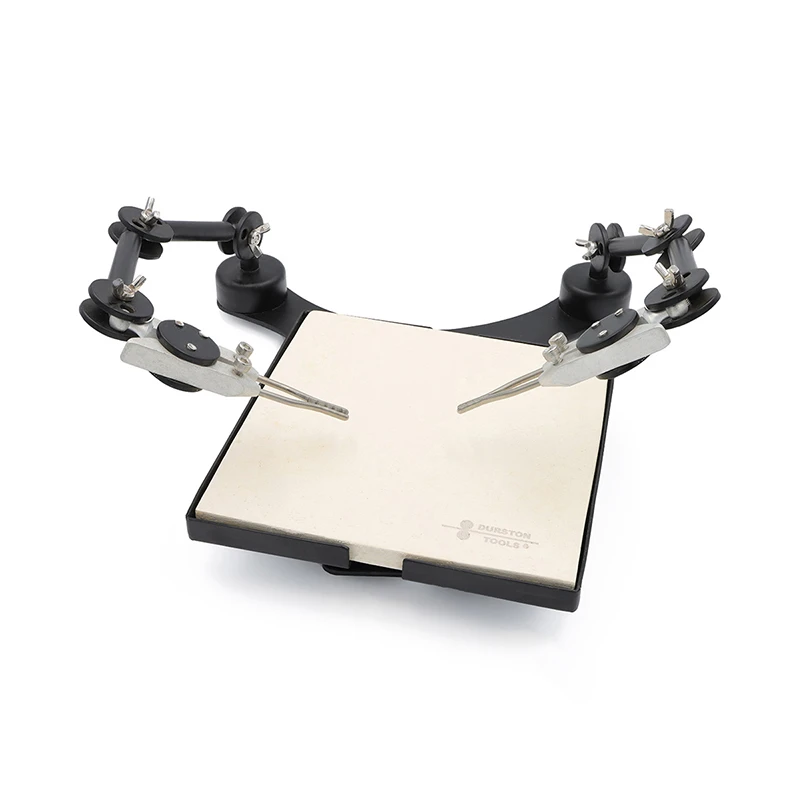 Durston soldering station featuring adjustable positioning arms and a heat-resistant ceramic honeycomb board.