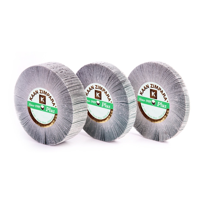 kaan zimpara® plus emery fan diamond grind full sandwich cap Trio arrangement of KAAN ZIMPARA Plus 100mm diamond emery flap wheels displaying side thickness variations and branded center hubs.
