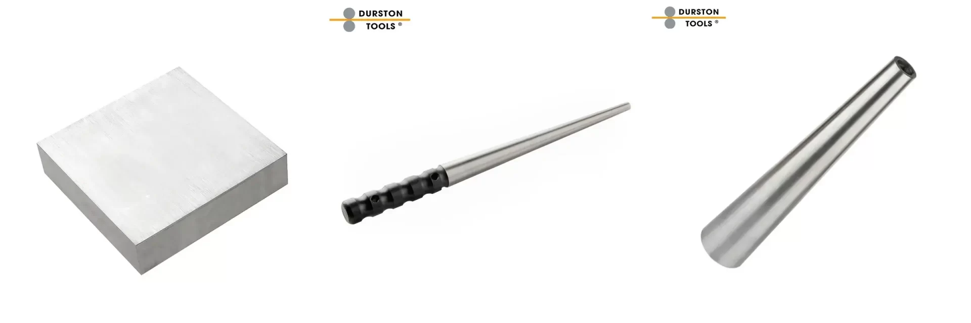 Square steel bench block and steel ring mandrels for jewelry sizing and metal forming.