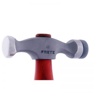 Close-up side profile of the Fretz HMR-6 planishing hammer head showing the polished steel dome face, Fretz logo, and gray plastic insert.