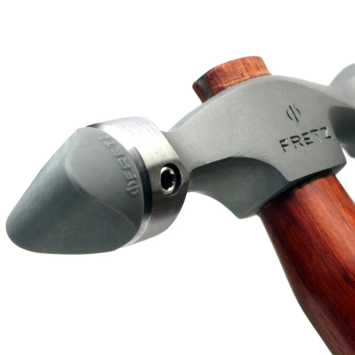 fretz® double ended insert hammer Macro perspective of the HMR-7 collar fitted with an angled chisel-profile plastic insert for tight concave shaping.