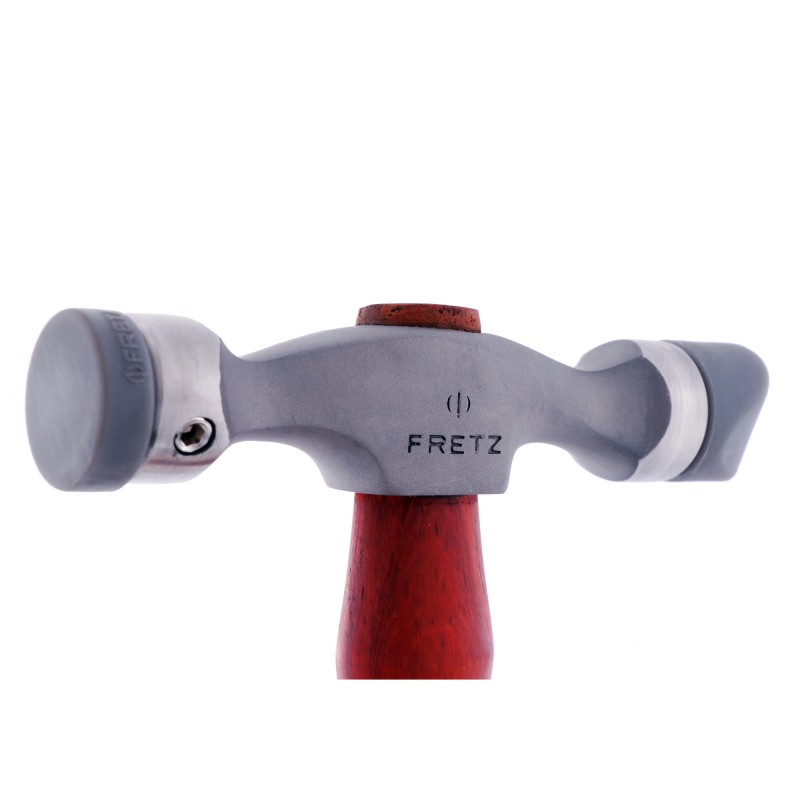 fretz® double ended insert hammer Close-up side profile of the Fretz HMR-7 double ended insert hammer head showing the stainless steel body, Fretz logo, and installed plastic ends.