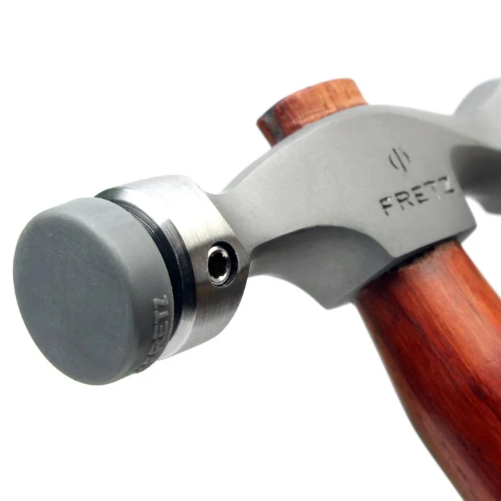 fretz® double ended insert hammer Detailed view of the Fretz HMR-7 hammer collar fitted with a flat 19mm plastic planishing face.