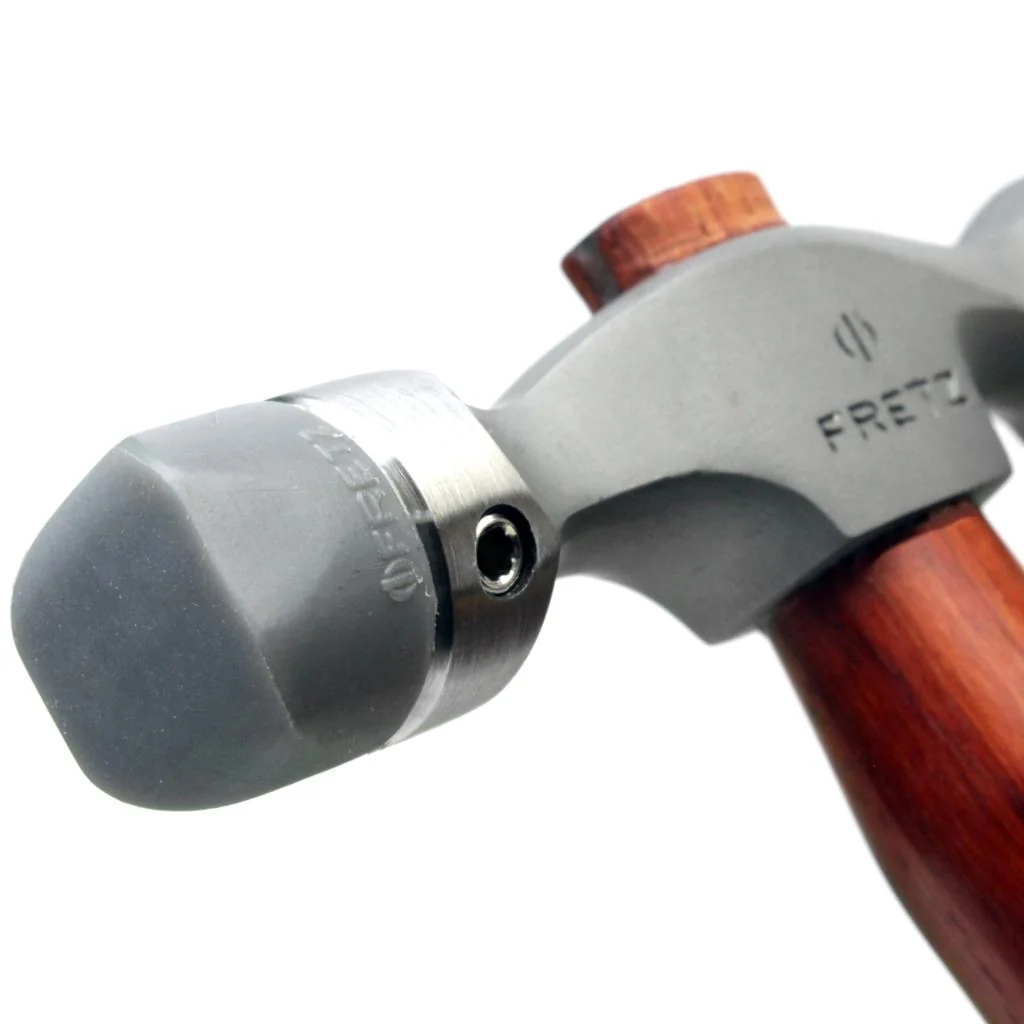 fretz® double ended insert hammer Close-up view of the Fretz HMR-7 collar fitted with a narrow rectangular raising plastic tip secured by a hex set screw.