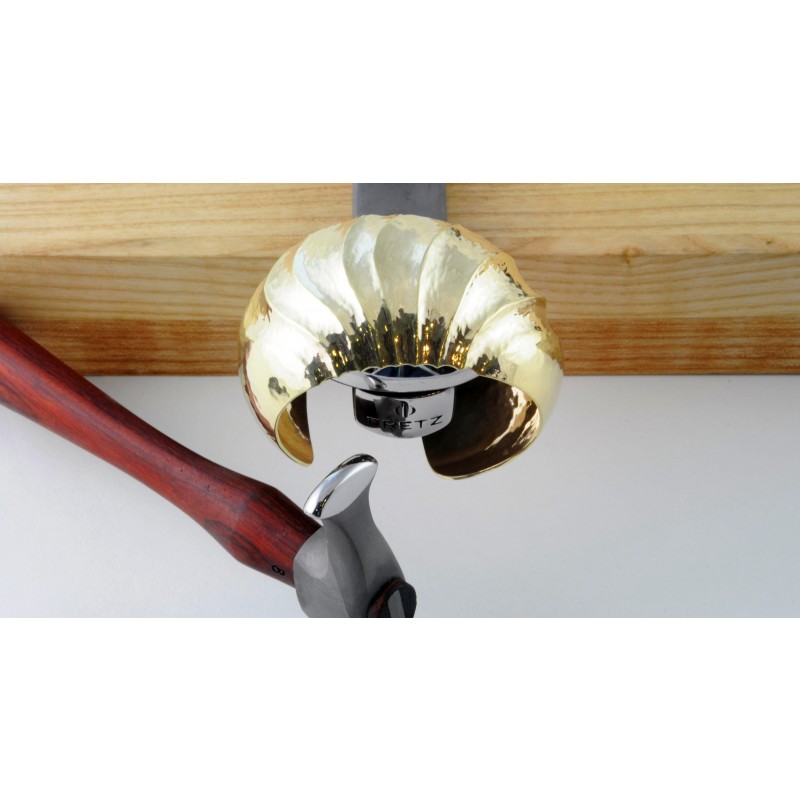 fretz® rounded narrow raising hammer In-use bench demonstration showing the Fretz HMR-8 hammer forming a fluted brass cuff over a steel silversmithing stake.