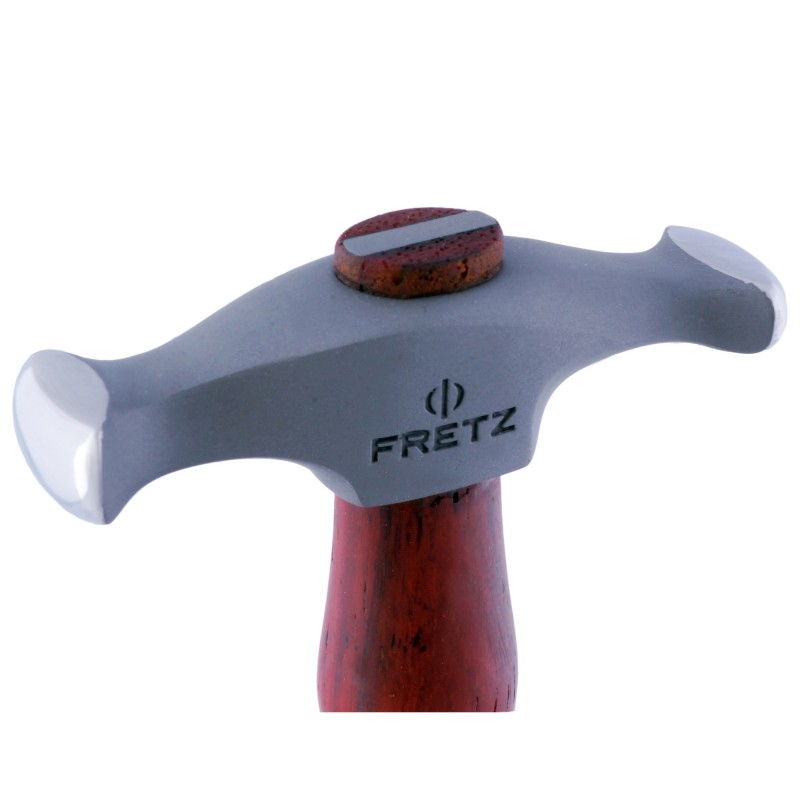 fretz® rounded wide raising hammer Close-up side profile of the Fretz HMR-9 rounded wide raising hammer head showing the engraved Fretz logo and polished wide convex face.