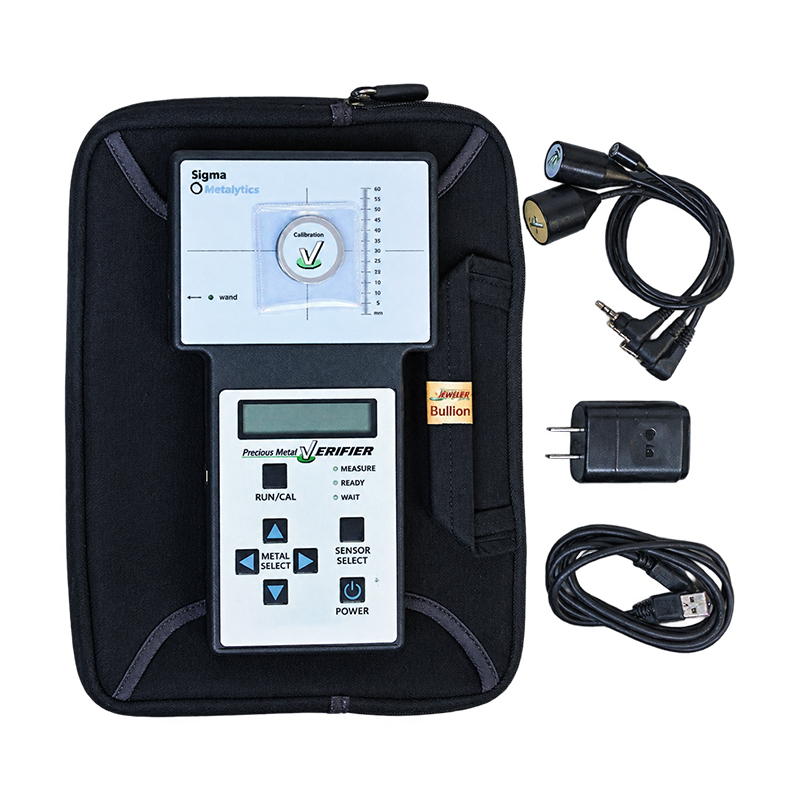 sigma metalytics precious metal verifier pmv original Sigma Metalytics PMV Original with calibration disc on sensor, case, wands, and charger.