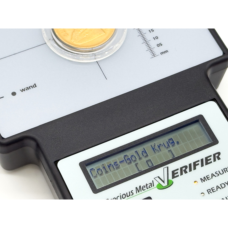 sigma metalytics precious metal verifier pmv original Close-up of Sigma Metalytics PMV Original LCD screen verifying a gold Krugerrand coin.