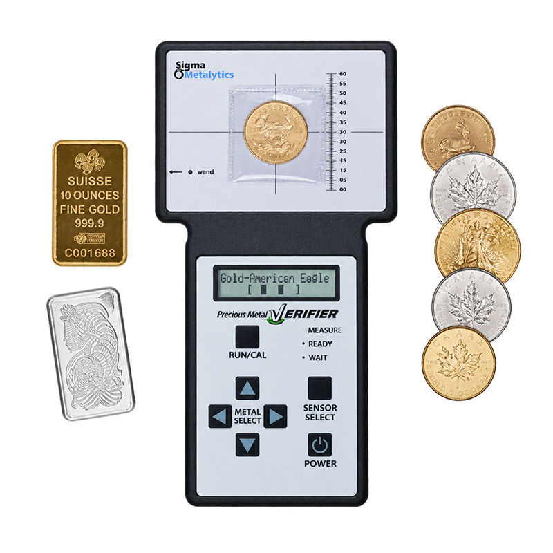 sigma metalytics precious metal verifier pmv original Sigma Metalytics PMV Original testing packaged gold coin alongside bullion bars and coins.