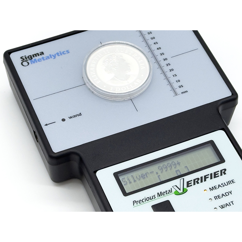 sigma metalytics precious metal verifier pmv original Testing encapsulated silver bullion coin on Sigma Metalytics PMV Original sensor plate.