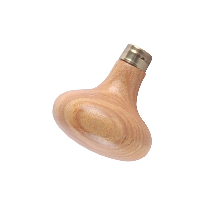 technique® asic handle oval Close angle focusing on the solid brass socket collar and smooth neck taper of the French beech wood handle.