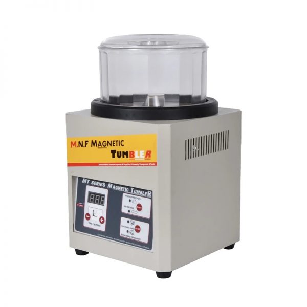 A slightly angled front view of the M.N.F. Magnetic Tumbler with control panel and branding.